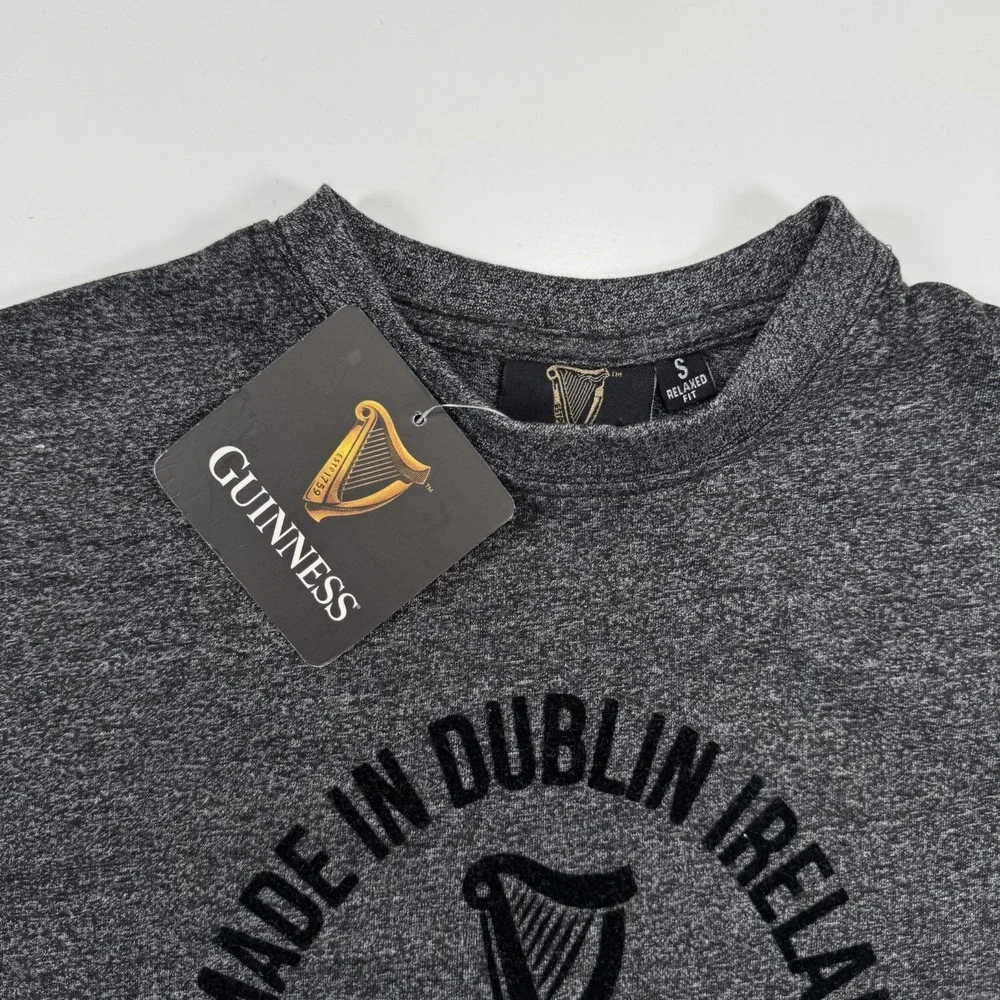 GUINNESS Short Sleeve Crew T-Shirt Small‎ Relaxed Black Grindle Felt Logo NWT